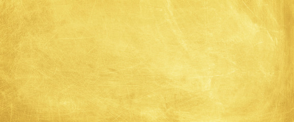 Gold texture background. Golden scratched surface