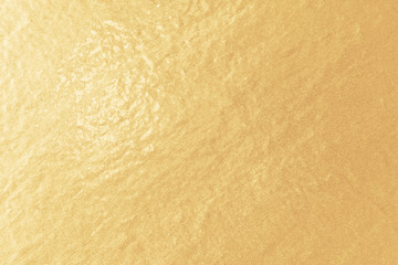 Poster - Gold foil paper texture. Light golden background