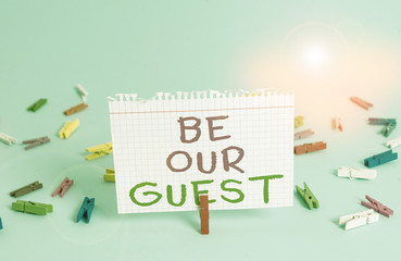 Wall Mural - Word writing text Be Our Guest. Business photo showcasing You are welcome to stay with us Invitation Hospitality Colored clothespin rectangle square shaped paper light blue background