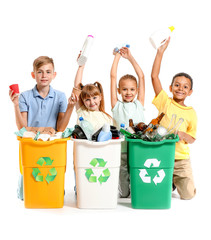 Little children and containers with trash on white background. Concept of recycling