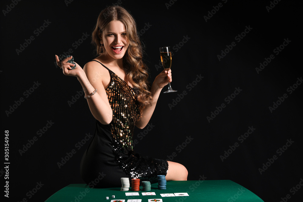Female player sitting on table in casino
