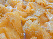 © Dimitrios - 'Diples' traditional Greek Christmas sweet fries, top view close up.