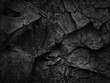 Leinwandbild Motiv Dark  stone background. Black white rock granite texture. Mountain surfase close-up. 