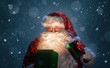 © rangizzz - Happy Santa Claus opening christmas gift box over snowy blue background with copy space
