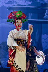 Wall Mural - Traditional Japanese performance. Actress in traditional kimono with long sleeves and had dancing.