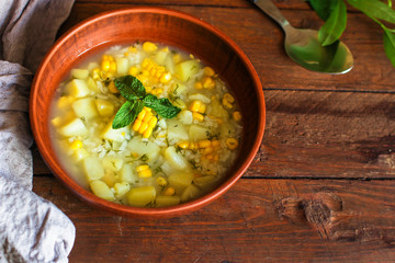 soup with corn and vegetables (first course, vegetarian dish) menu concept. food background. copy space. Top view