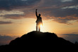 silhouette of man standing on the hill,Business, success,victory,leadership,achievement concept.