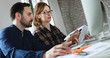 © NDABCREATIVITY - Portrait of young designers working on computer