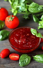 Canvas Print - tomato jam or marmalade with basil. unusual jam. Turkish, French or Italian cuisine. copy space