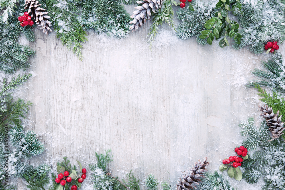 Christmas and New Year background with fir branches and snowfall on ...