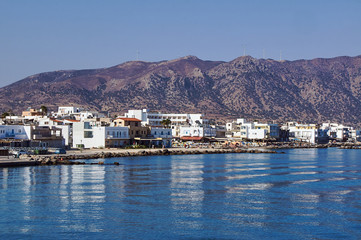 Poster - A town with a port and beach on the coast of the island of Kos in Greece.