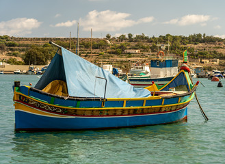 Wall Mural - view of the harbor with boats, of marsaxlokk on malta