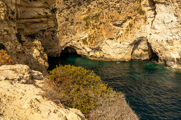 Wall Mural - view of malta coast and mediterranean sea at blue grotto, malta