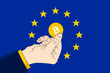Bitcoin in the EU - Hand holding a bitcoin in front of the European Union flag. E.U is bullish on bitcoin concept. Flat vector illustration.