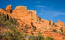 Towering Cliffs Of Red Sandstone In Southern Utah Desert Near Bryce Canyon National Park.