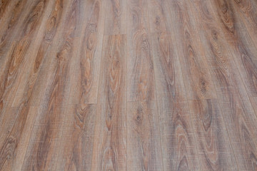 Sticker - The floor of the light brown laminate diagonally