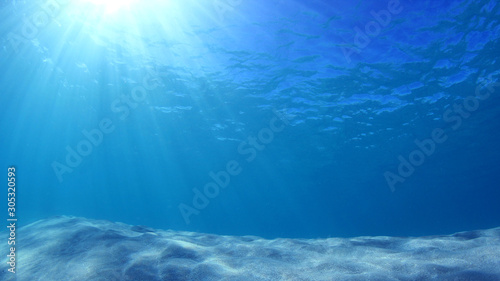 Underwater Photo Of Blue Ocean Sunbeams And Sandy Sea Floor Buy