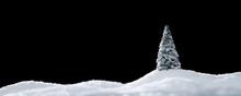 Wintery Landscape With Single Tree On Glistening White Snow Drifts Isolated On Black