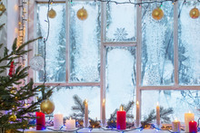 Christmas Decorations On Old Wooden Window