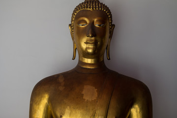 Great Buddha statue in typical Asian temple. Sacred religious figure