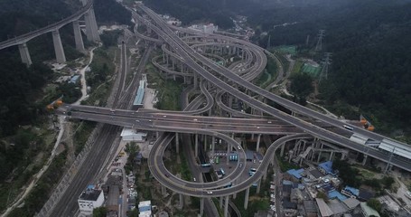 Wall Mural - aerial view of buildings and highway interchange in dawn in Guiyang, China