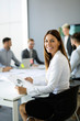 © NDABCREATIVITY - Business colleagues in conference room during meeting