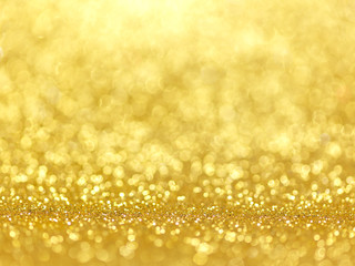 Wall Mural - gold festive christmas background. abstract twinkled bright background with bokeh defocused golden l