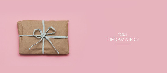 Wall Mural - Small parcel wrapped in craft paper and tie blue thread. Dirty pink background. Web article template. Long header banner format. Sale coupon. Visit card. Your information. Text space.