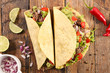 tacos with beef, avocado and tomato- tortilla bread