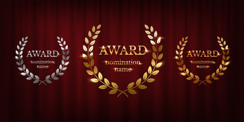 Wall Mural - golden, silver and bronze award signs with laurel wreath isolated on red curtain background. vector 
