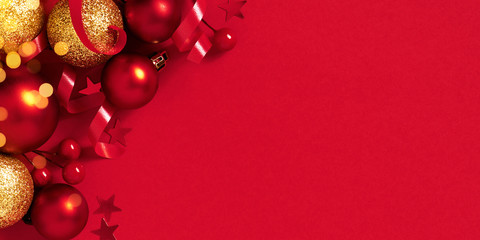 Christmas or New Year Festive red banner with Christmas balls and lights