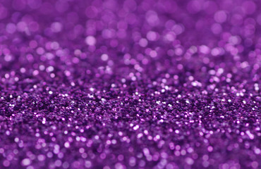  Purple glitter lights background. defocused