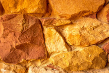 Stone Texture. Brown And Orange Rock Background. Surface Of The Rock. Close Up Of Rock Texture. Background For Design. Copy Space.