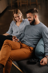 Poster - Young happy couple. Boyfriend and girlfriend having fun.