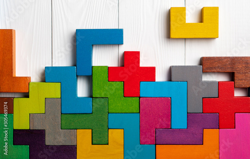 Cuadros en Lienzo Top view on colorful wooden blocks folding on white wooden background