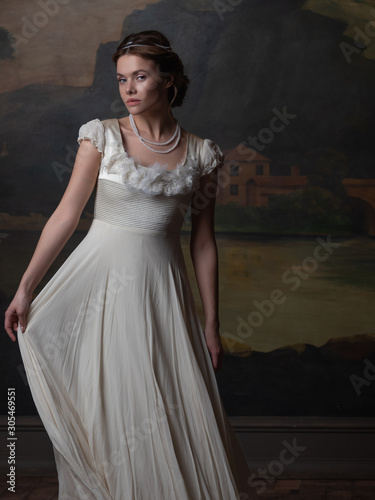 Beautiful young woman in a white long dress in the style of the 19th century Poster Mural XXL