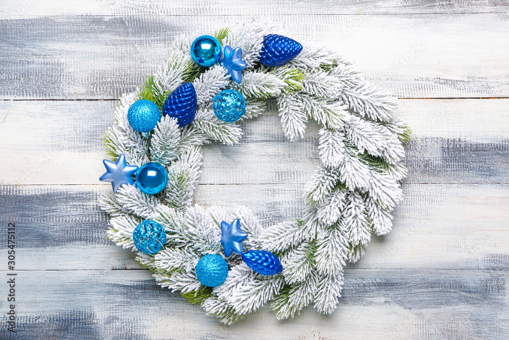 Beautiful Christmas wreath on wooden background