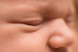 © Irina - baby's face, eyes and nose. newborn baby, macro shot