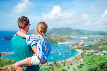 Wall Mural - Family enjoying the view of picturesque English Harbour at Antigua in caribbean sea