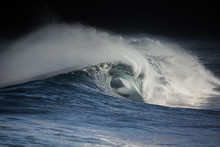 Powerful Blue Breaking Ocean Waves With White Foam On Black Background 