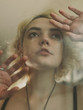 © Natalia Nieves/ADDICTIVE STOCK - Charming melancholy woman looking away