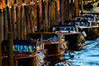 taxi boats docked along the Grand Canal of Venice, Italy