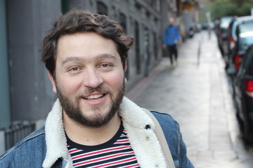 Real looking healthy guy smiling outdoors