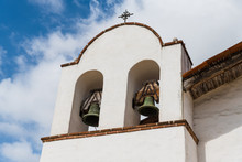 White Spanish Mission Church Bell Tower With Two Bells In Santa Barbara, California, USA