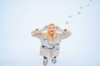 © Volodymyr - Enjoying nature wintertime. Winter landscape background. Funny young woman in the winter time. Love winter. Beautiful woman walking in winter park and feeling wonderful.