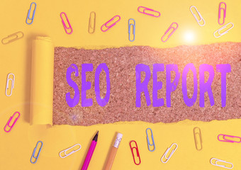 Fototapete - Conceptual hand writing showing Seo Report. Concept meaning notifying on how website is performing in search engine results Stationary and torn cardboard on a wooden classic table backdrop