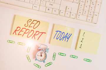 Fototapete - Handwriting text Seo Report. Conceptual photo notifying on how website is performing in search engine results Empty orange square papers and clock by the pc keyboard with copy space