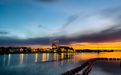 Wall Mural - Long Exposure sunset contrasts with the sky in many colorful. Beautiful morning At the bank of the menominee river