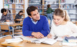 © JackF - Young people preparing for exam in library