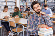 © JackF - Sad tired man sitting in library